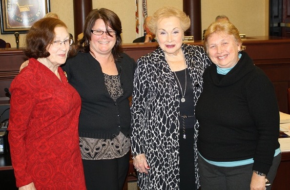 Commissioner Ellen Terry, Friends of Millstone Township Historic Properties Vice President Debbie Novellino, Freeholder Director Lillian G. Burry and Friends of Millstone Township Historic Properties President Patricia Butch attend the Monmouth County Historical Commission’s preservation grant award ceremony on Monday, Feb. 24 in Freehold, NJ. Debbie Novellino and Patricia Butch accepted a $5,000 grant for roof repair at Baird House in Millstone.